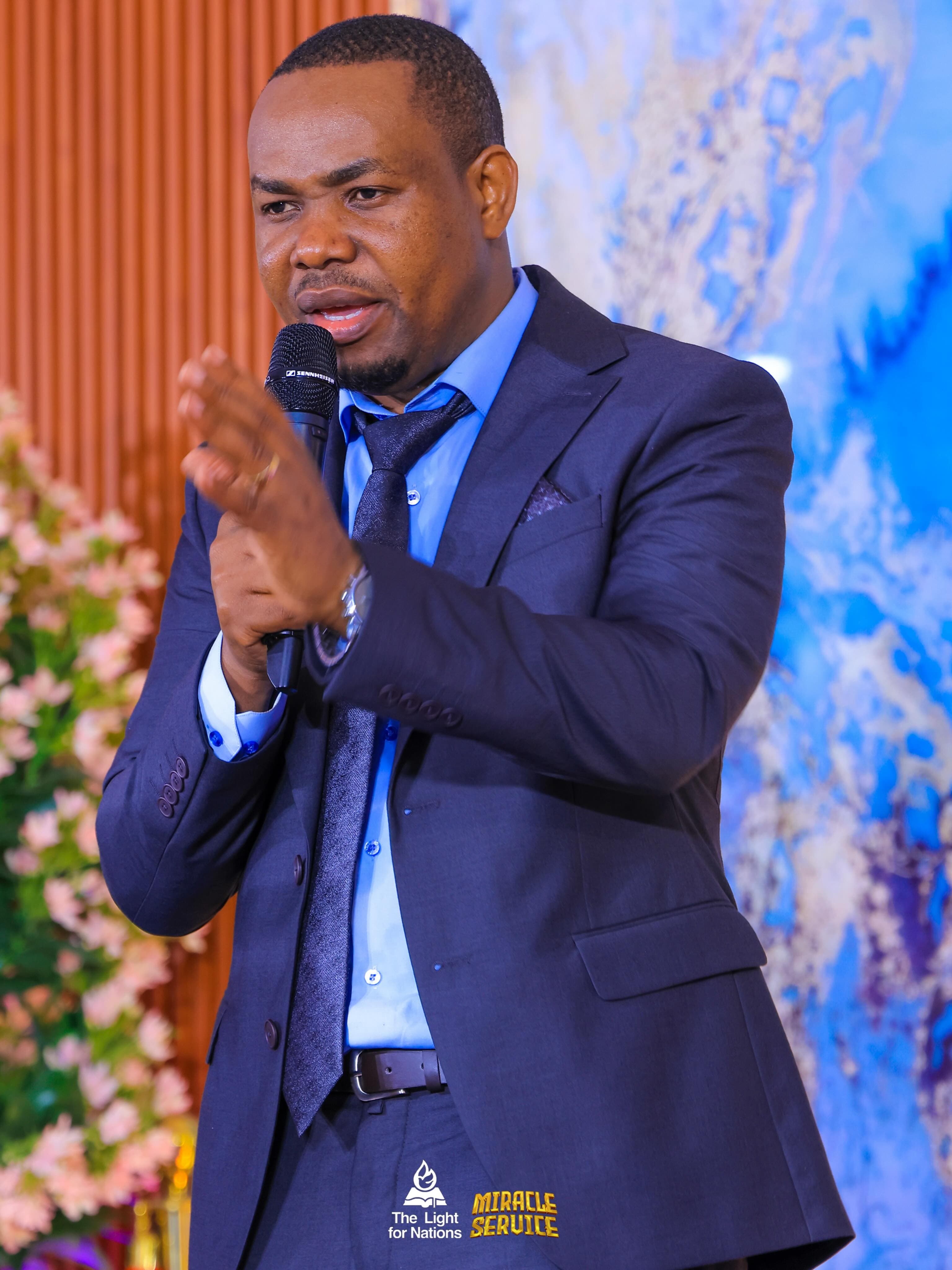A TLN leader speaking during a gathering